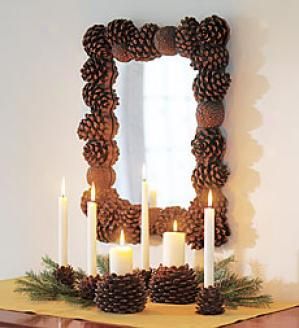 Great, easy Christmas decor. Exchange the evergreen boughs for leaves and vines and the pine cone candle holders for pumpkin candle holders to get a great Autumn display.